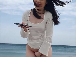 teen got catch at the beach playing with vibe toy for orgasm control